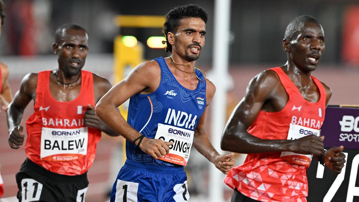 Indian athletes compete alongside international competitors during track and field events at the Asian Games.
