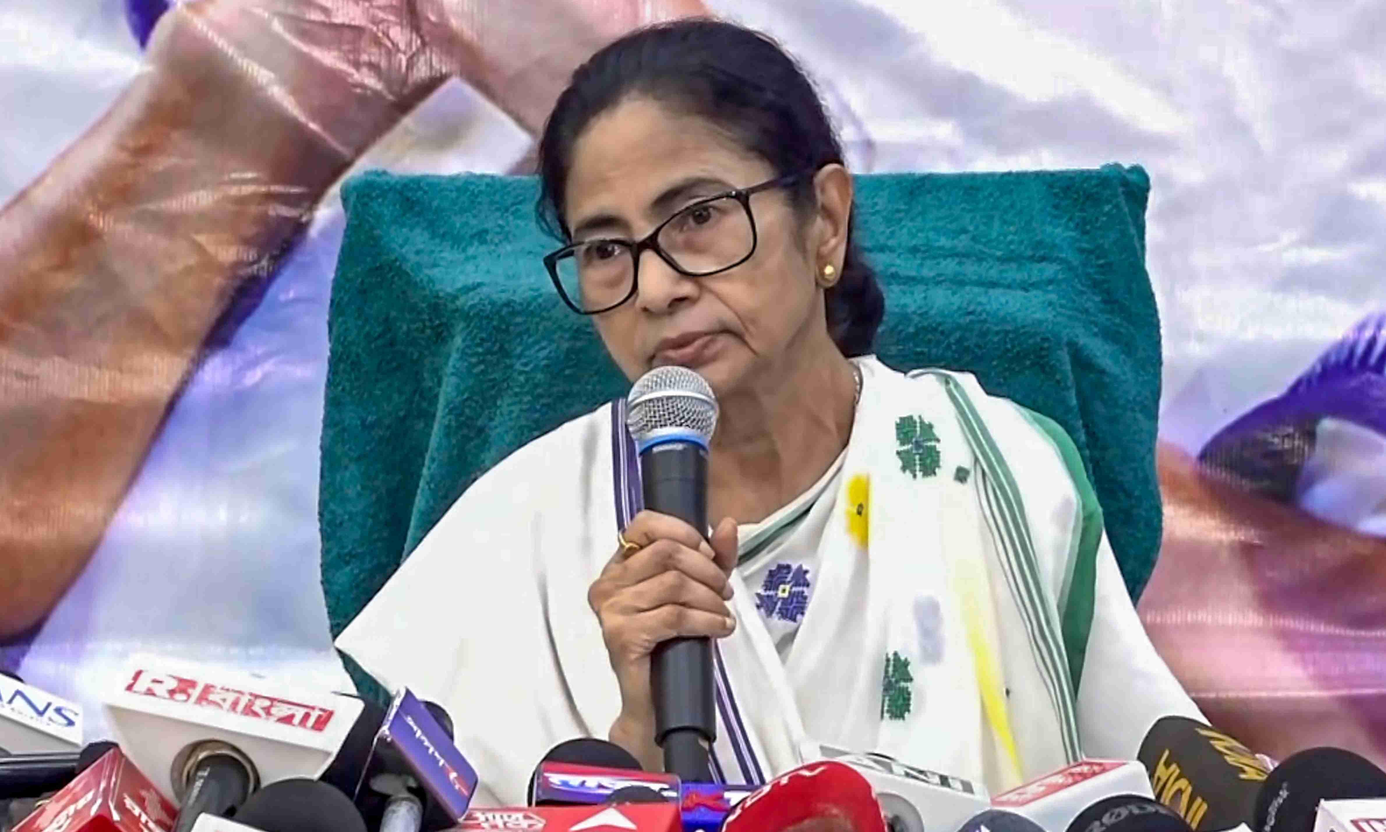 West Bengal Chief Minister Mamata Banerjee speaking at a press conference regarding election concerns.