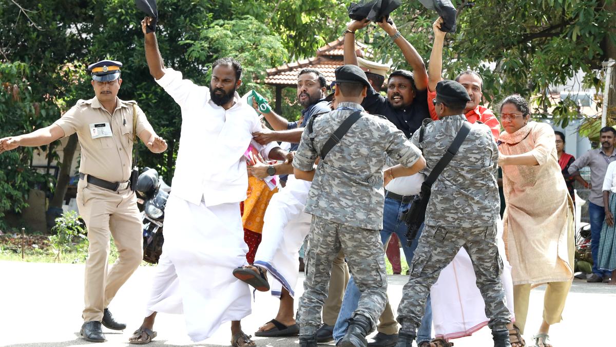 Union Home Minister Amit Shah faces a black-flag protest by Youth Congress activists in Kollam as security forces clear the route.