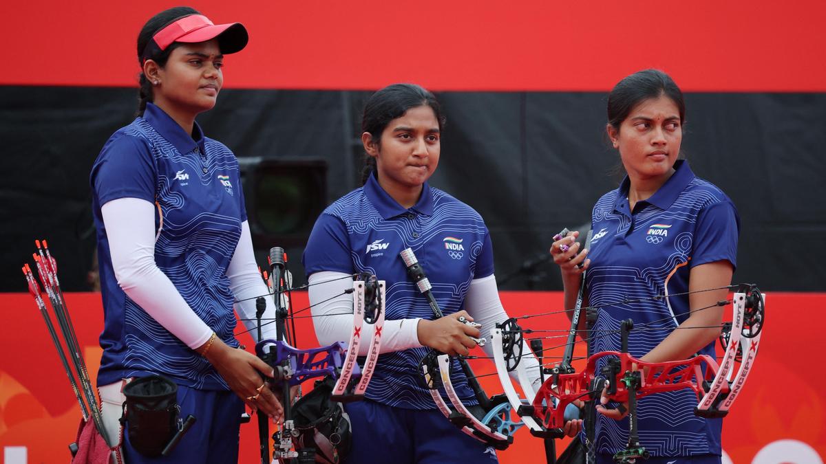 India's women's compound archery team proudly displays their gold medals at the 2026 Asian Games.