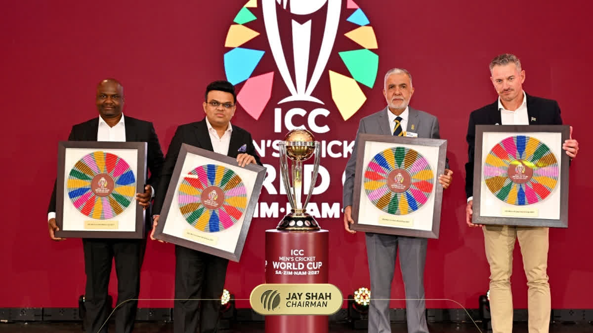 Tournament organizers and officials pose with the ICC Men's Cricket World Cup 2027 branding and trophy.