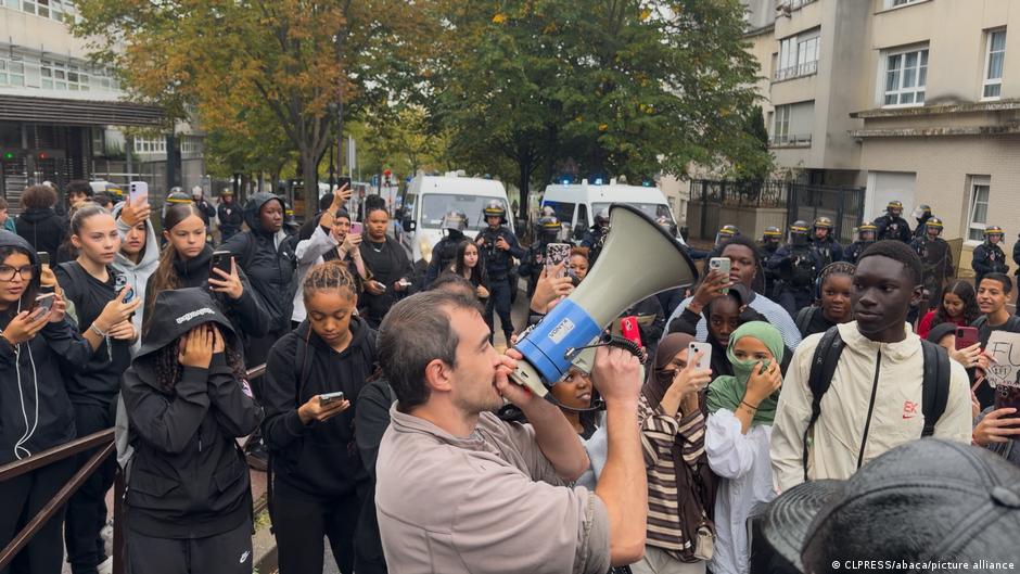 Students and demonstrators gather during protests across France that led to clashes and arrests.